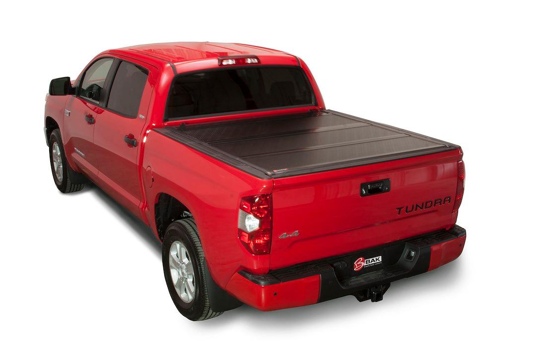 BAK 1126446 BAKFLIP FIBERMAX, Hard Folding; Low Profile; 2 Folds/ 3 Panels; Front Hinge Allows Entire Tonneau To Flip Up When Folded; Gloss Black; Fiberglass Covered Aluminum; Lockable Using Tailgate Handle Lock; Can Be Used With BAK Tool Box - The Twister Group Tools product