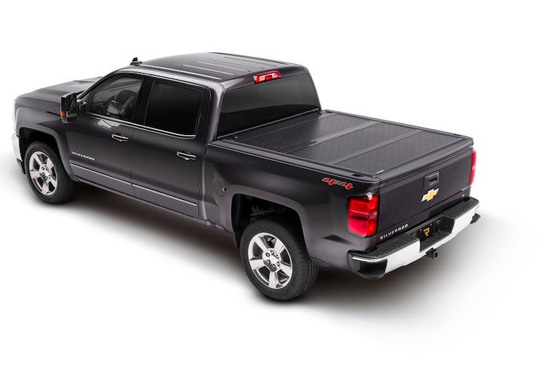 BAK 226121 Tonneau Cover; BAKFlip G2; Hard Folding; 2 Folds/ 3 Panels; Front Hinge Allows Entire Tonneau to Flip Up When Folded; Lockable Using Tailgate Handle Lock; Black; Aluminum; Can Be Used With BAK Tool Box - The Twister Group Tools product