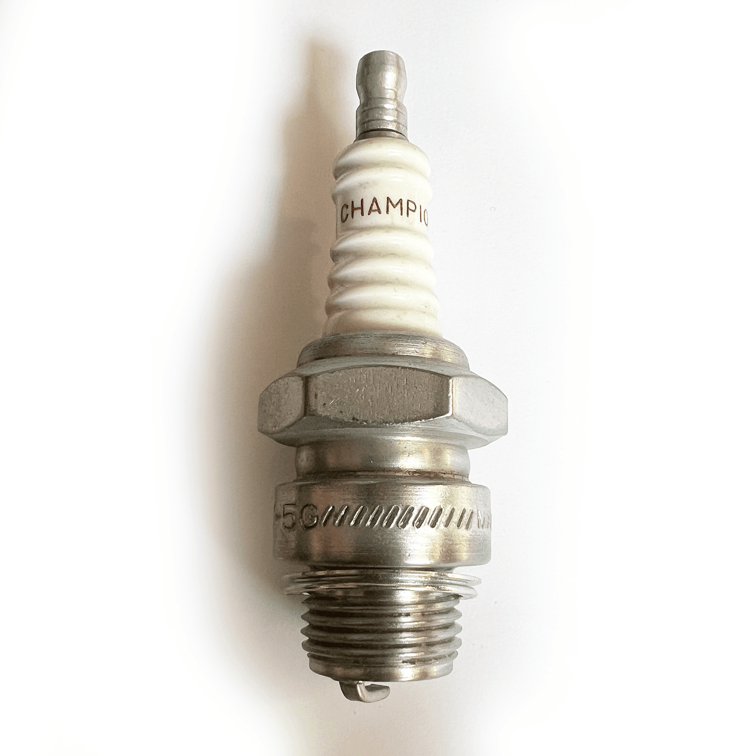 Champion Spark Plug K5G - High quality product image showing Champion Spark Plug K5G details and features Champion Spark Plug K5G - High quality product image showing Champion Spark Plug K5G details and features